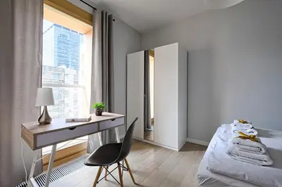 Łóżko lub łóżka w pokoju w obiekcie Warsaw Hub ApartHotel