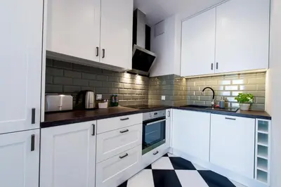 Kuchnia lub aneks kuchenny w obiekcie Warsaw Hub ApartHotel