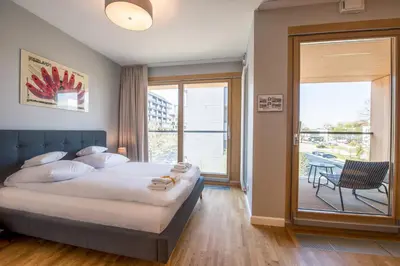 Łóżko lub łóżka w pokoju w obiekcie Warsaw Hub ApartHotel