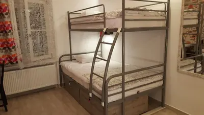 Łóżko lub łóżka w pokoju w obiekcie Hostel Lwowska 11