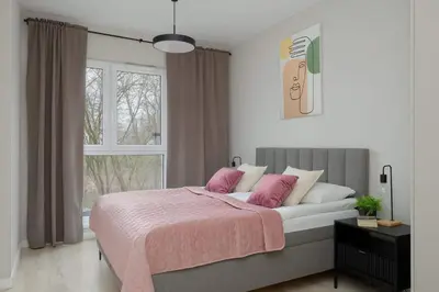 Łóżko lub łóżka w pokoju w obiekcie Modern & Bright Apartment Marywilska in Warsaw with Parking by Noclegi Renters