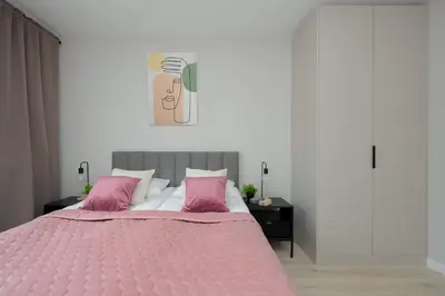 Łóżko lub łóżka w pokoju w obiekcie Modern & Bright Apartment Marywilska in Warsaw with Parking by Noclegi Renters
