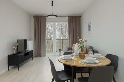 Część wypoczynkowa w obiekcie Modern & Bright Apartment Marywilska in Warsaw with Parking by Noclegi Renters