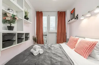 Łóżko lub łóżka w pokoju w obiekcie Lumina cozy 3-rooms apartments near the city center