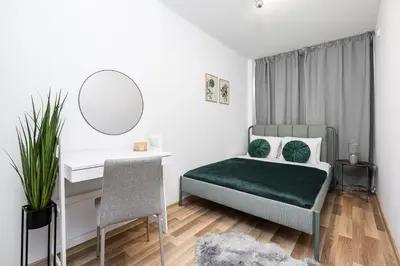 Łóżko lub łóżka w pokoju w obiekcie Lumina cozy 3-rooms apartments near the city center