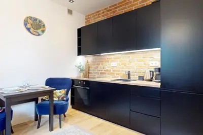 Kuchnia lub aneks kuchenny w obiekcie Eclipse Apartment Metro Wierzbno Mokotow