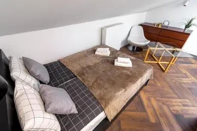 Łóżko lub łóżka w pokoju w obiekcie Close - Marcinkowskiego 2