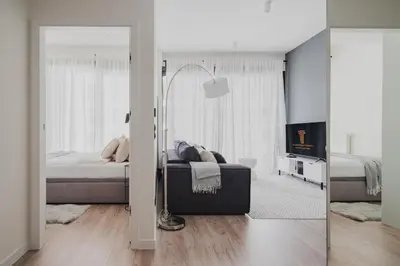 Łóżko lub łóżka w pokoju w obiekcie Towarowa Towers Aparthotel