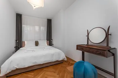 Łóżko lub łóżka w pokoju w obiekcie Apartment Sady Żoliborskie by Your Freedom