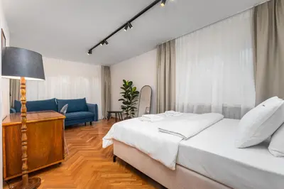 Łóżko lub łóżka w pokoju w obiekcie Apartment Sady Żoliborskie by Your Freedom