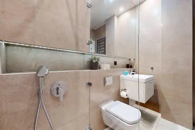 Łazienka w obiekcie Lumiere Apartment City Center Hoza