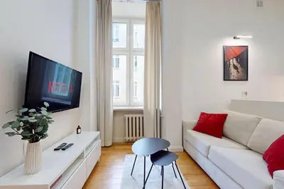 Telewizja i/lub zestaw kina domowego w obiekcie Lumiere Apartment City Center Hoza