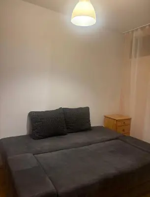 Łóżko lub łóżka w pokoju w obiekcie Zakątek