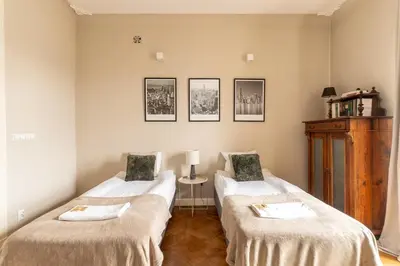 Łóżko lub łóżka w pokoju w obiekcie Warsaw Concierge Wilcza