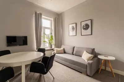 Telewizja i/lub zestaw kina domowego w obiekcie Warsaw Concierge Wilcza