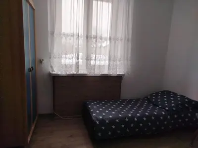 Łóżko lub łóżka w pokoju w obiekcie Iriska Home