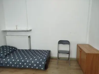 Łóżko lub łóżka w pokoju w obiekcie Iriska Home
