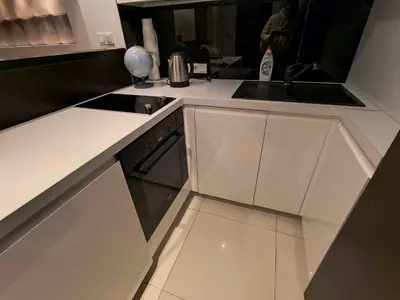 Kuchnia lub aneks kuchenny w obiekcie Żelazna Cityview Apartment