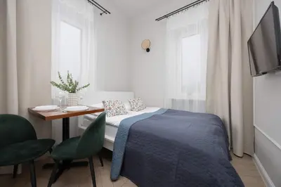 Łóżko lub łóżka w pokoju w obiekcie Budget-Friendly Mokotów Micro-Apartment For 2 Guests in Warsaw by Noclegi Renters