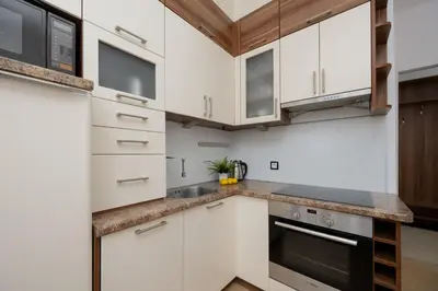 Kuchnia lub aneks kuchenny w obiekcie Vibrant Mokotów Business Centre Apartment Warsaw by Noclegi Renters