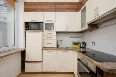 Kuchnia lub aneks kuchenny w obiekcie Vibrant Mokotów Business Centre Apartment Warsaw by Noclegi Renters