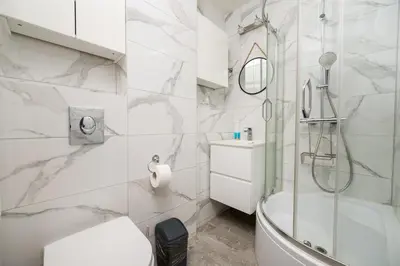 Łazienka w obiekcie Żuromińska Comfort Studio by BookingHost