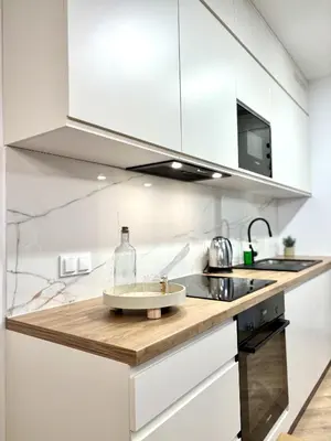 Kuchnia lub aneks kuchenny w obiekcie Golden Stay Luxury 3-Bedroom Apartment in Warsaw