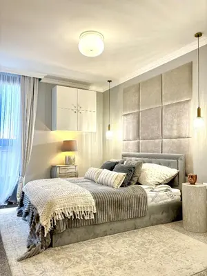 Łóżko lub łóżka w pokoju w obiekcie Chłodna Premium 2-Bedroom Apartment, City Center