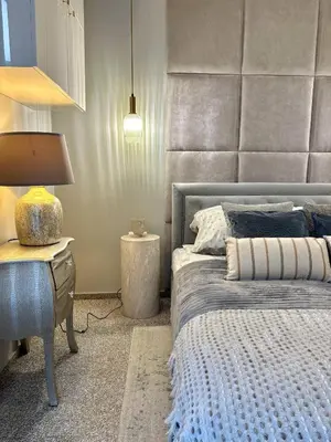 Łóżko lub łóżka w pokoju w obiekcie Chłodna Premium 2-Bedroom Apartment, City Center