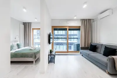 Łóżko lub łóżka w pokoju w obiekcie Close-Urban Chic - Luxury Studio - Mennica Residence