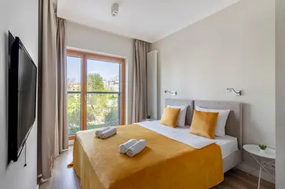 Łóżko lub łóżka w pokoju w obiekcie Close-Urban Chic - Luxury Studio - Mennica Residence