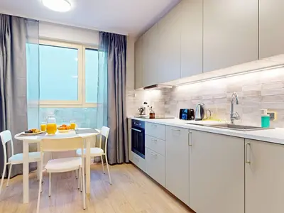Kuchnia lub aneks kuchenny w obiekcie Softspace Studio With Parking Mokotow