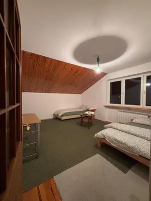 Łóżko lub łóżka w pokoju w obiekcie CityHalo Hostel