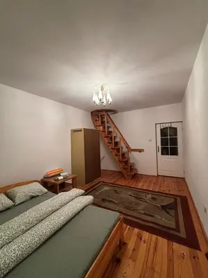 Łóżko lub łóżka w pokoju w obiekcie CityHalo Hostel