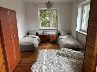 Łóżko lub łóżka w pokoju w obiekcie CityHalo Hostel