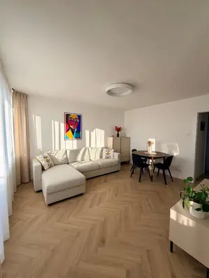 Łóżko lub łóżka w pokoju w obiekcie Darwina 15A Apartament Praga Północ