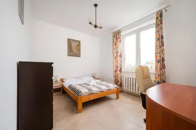 Łóżko lub łóżka w pokoju w obiekcie Kino Femina Homely Apartment by BookingHost