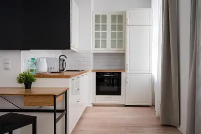 Kuchnia lub aneks kuchenny w obiekcie W Rytmie Nowej Pragi Chic Apartment by BookingHost