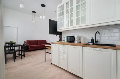 Kuchnia lub aneks kuchenny w obiekcie W Rytmie Nowej Pragi Chic Apartment by BookingHost