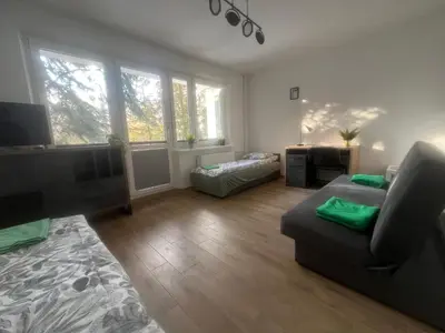Łóżko lub łóżka w pokoju w obiekcie Pokoje Metro Imielin