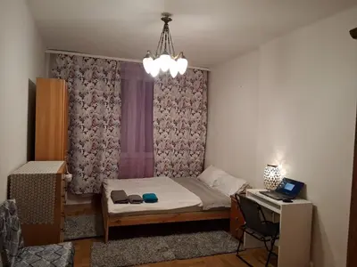 Łóżko lub łóżka w pokoju w obiekcie Just room in flat near Royal Lazienki Park
