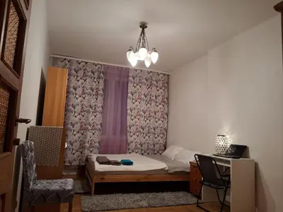 Łóżko lub łóżka w pokoju w obiekcie Just room in flat near Royal Lazienki Park