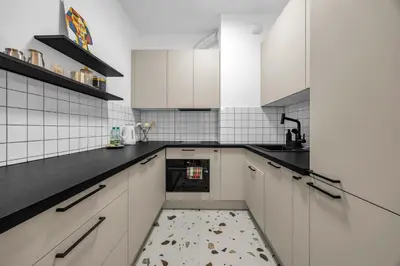 Kuchnia lub aneks kuchenny w obiekcie Namysłowska Superior Apartment by BookingHost