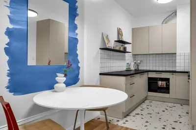 Kuchnia lub aneks kuchenny w obiekcie Namysłowska Superior Apartment by BookingHost