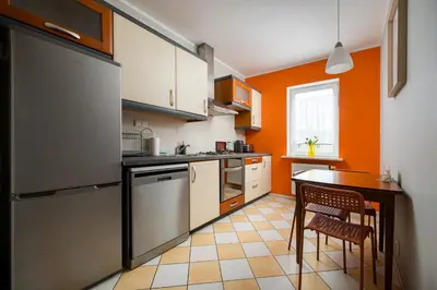 Kuchnia lub aneks kuchenny w obiekcie Metro Ursynów Homely Apartment by BookingHost