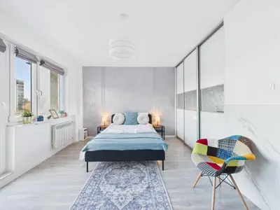 Łóżko lub łóżka w pokoju w obiekcie Sosnowskiego SuperApart - comfort on Ursynow