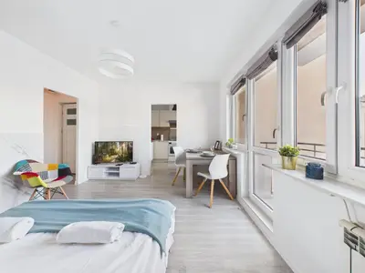 Łóżko lub łóżka w pokoju w obiekcie Sosnowskiego SuperApart - comfort on Ursynow