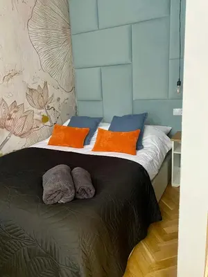 Łóżko lub łóżka w pokoju w obiekcie Chillout City Center Apartment PN73