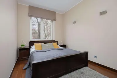 Łóżko lub łóżka w pokoju w obiekcie Tasteful and Spacious Two Bedroom Apartment by Noclegi Renters