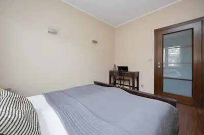 Łóżko lub łóżka w pokoju w obiekcie Tasteful and Spacious Two Bedroom Apartment by Noclegi Renters